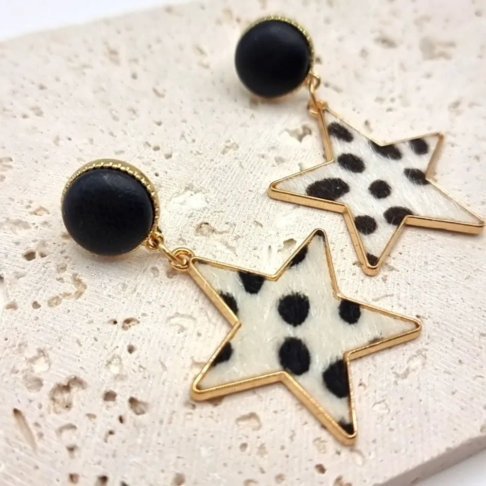 FREE PEOPLE City slickers faux cow hyde star earrings | NWOT